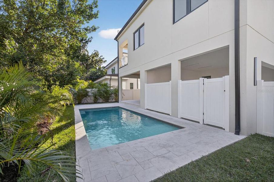 Exterior details and patio area of a home in , Tampa (Image 35).