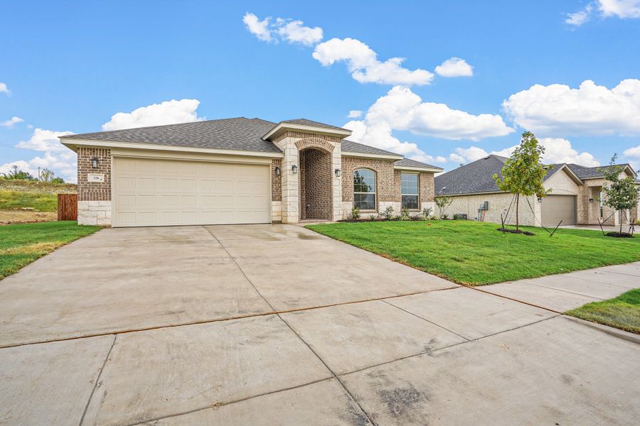 Representative exterior photo of a completed home built from the Waterford III by Cheldan Homes in Stoneview, Glen Rose, TX (Image 27).