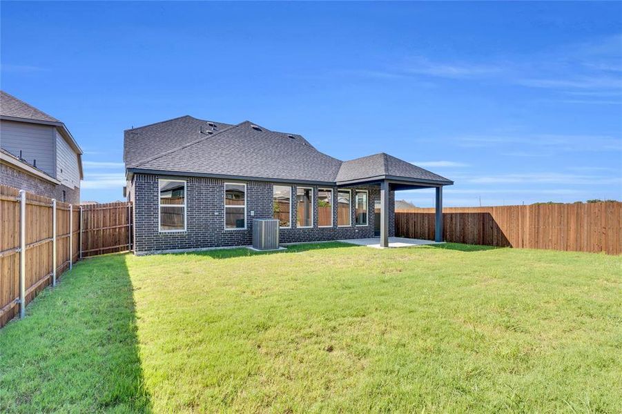 Exterior details and patio area of a home in Mercer Meadows, Royse City (Image 16). Exterior details and patio area of a home in Mercer Meadows, Royse City (Image 16).