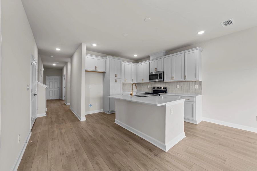 Furnished interior view inside a new home in Blue Heron Retreat, Little River (Image 8).