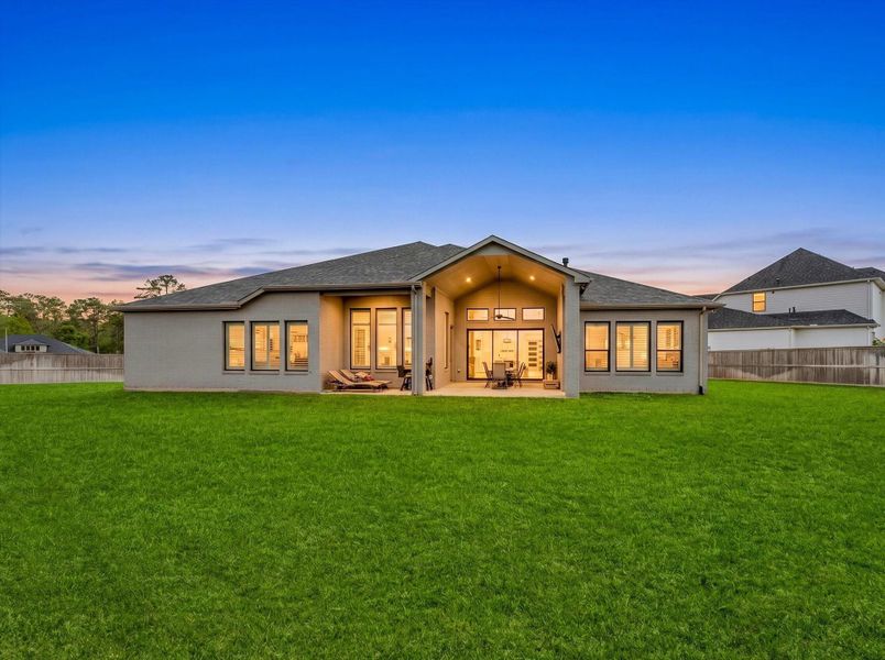The oversized backyard offers endless possibilities for creating your dream outdoor oasis.