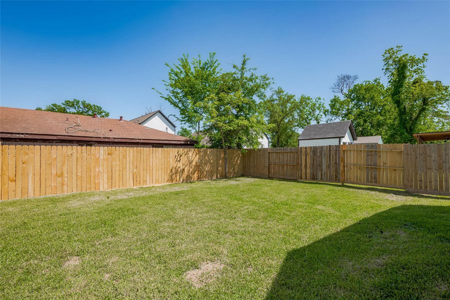 Exterior details and patio area of a home in , Houston (Image 3).