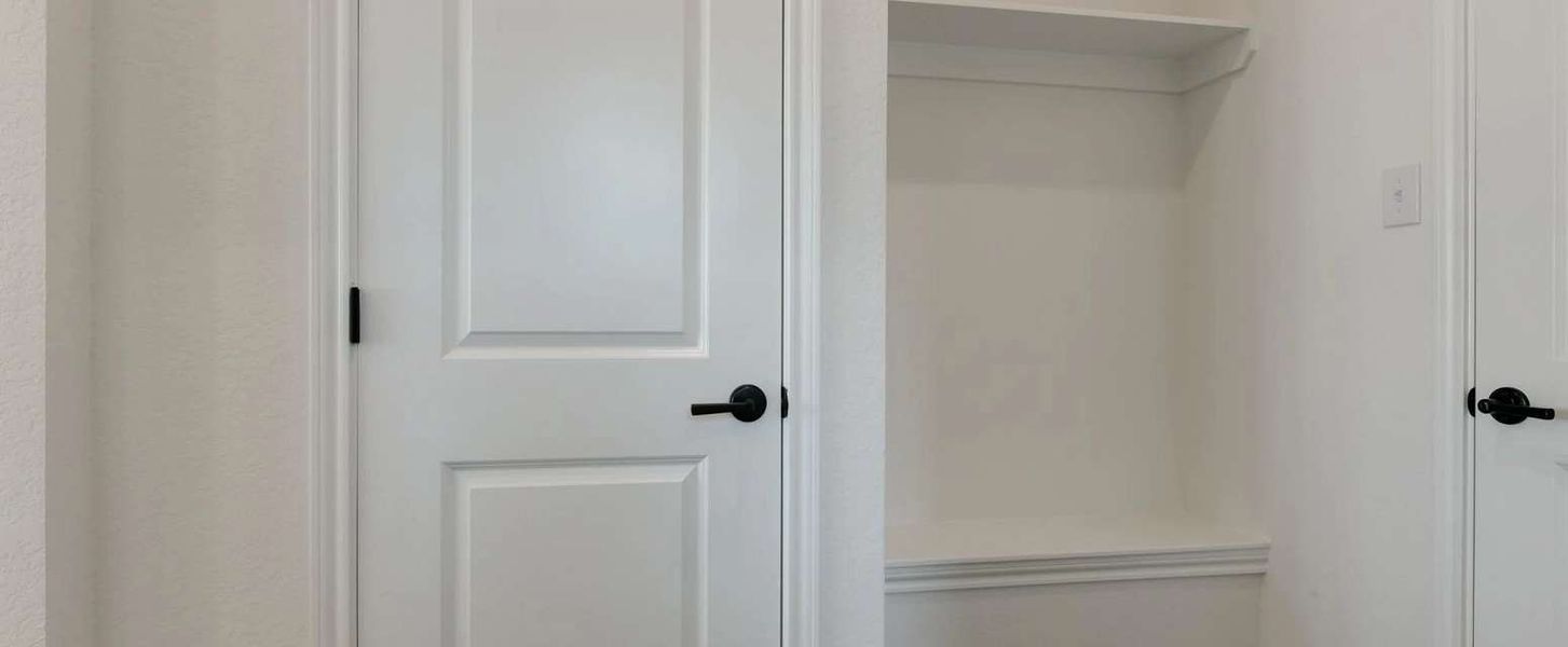 Image 21 representing the Ellington by Ashton Woods in Megan's Landing 70's, Castroville, TX.