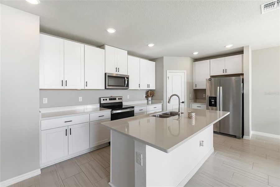 Furnished interior view inside a new home in Salt Meadows - Classic Series, Parrish (Image 14).