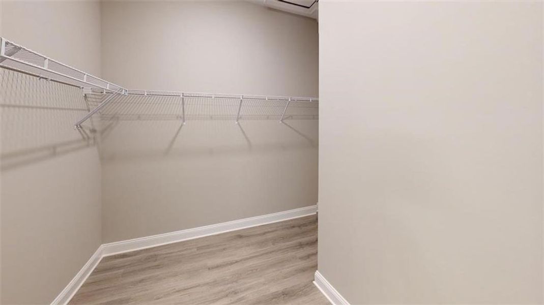 Spacious, unfurnished interior of a new home in The Courtyards at Redbud Lane, Holly Springs (Image 21).