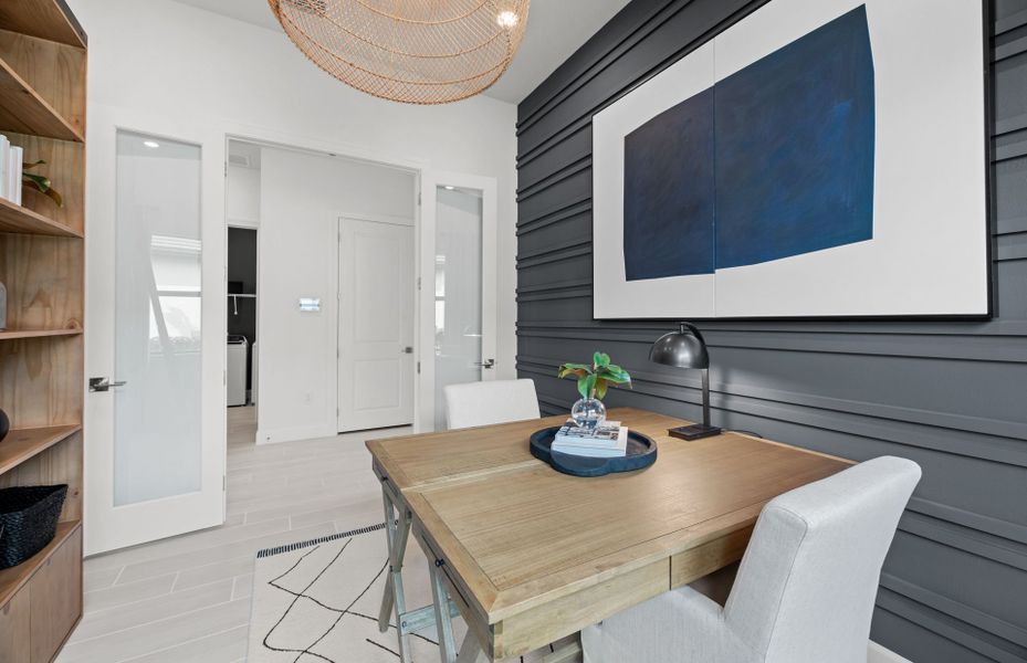 Representative furnished interior of a home built from the Prosperity by DiVosta in BeachWalk by Manasota Key, Englewood (Image 10).