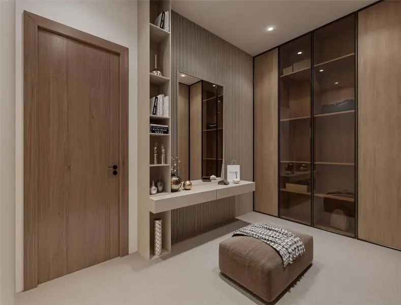 Spacious closet featuring carpet flooring Spacious closet featuring carpet flooring