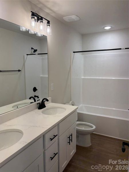 Furnished interior view inside a new home in , Lenoir (Image 8).