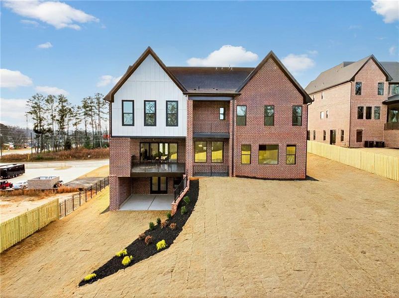 Front exterior of a new home in , Buford, GA, highlighting curb appeal (Image 2). Front exterior of a new home in , Buford, GA, highlighting curb appeal (Image 2).