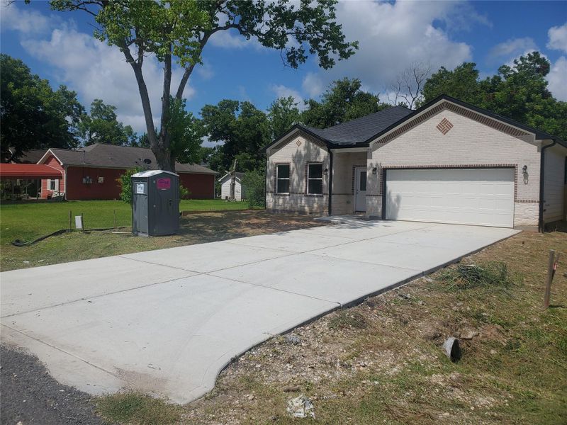 Front exterior of a new home in , Texas City, TX, highlighting curb appeal (Image 16). Front exterior of a new home in , Texas City, TX, highlighting curb appeal (Image 16).