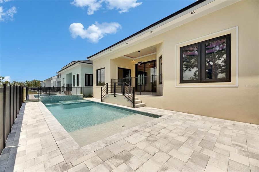 Front exterior of a new home in , Apollo Beach, FL, highlighting curb appeal (Image 27).