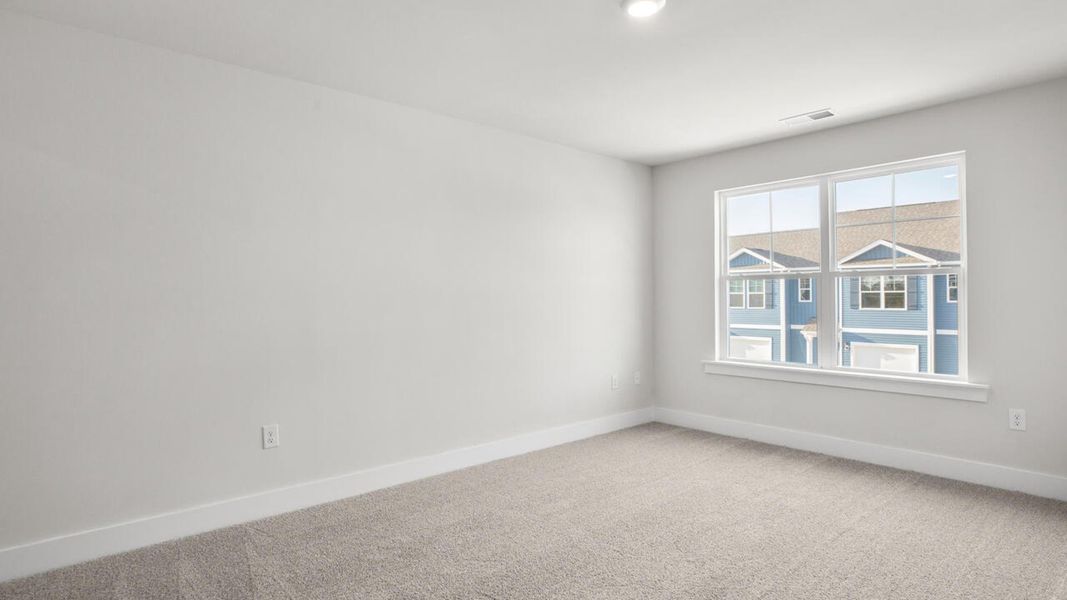 Spacious, unfurnished interior of a new home in Indigo Preserve Townhomes, Leland (Image 20).