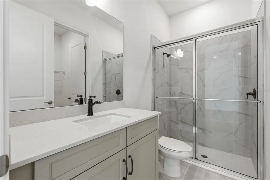 Furnished interior view inside a new home in Parkdale Place, Oviedo (Image 4).