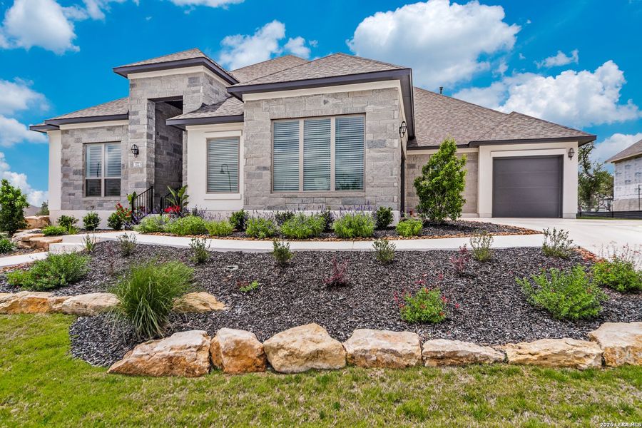 Front exterior of a new home in Esperanza - 80' & 90', Boerne, TX, highlighting curb appeal (Image 20).