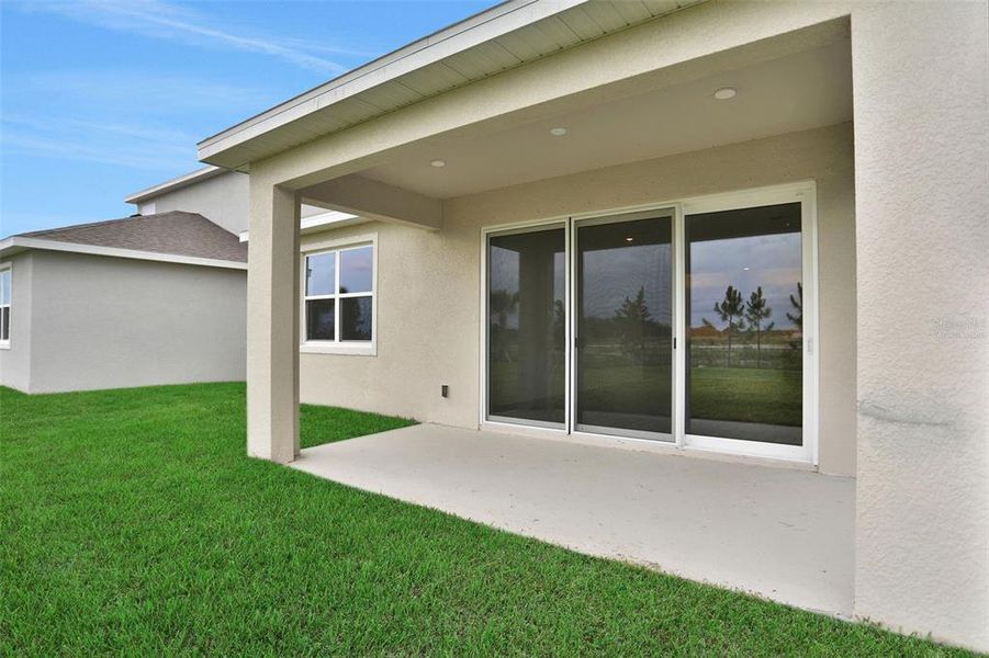 Exterior details and patio area of a home in Turnleaf, Punta Gorda (Image 25).