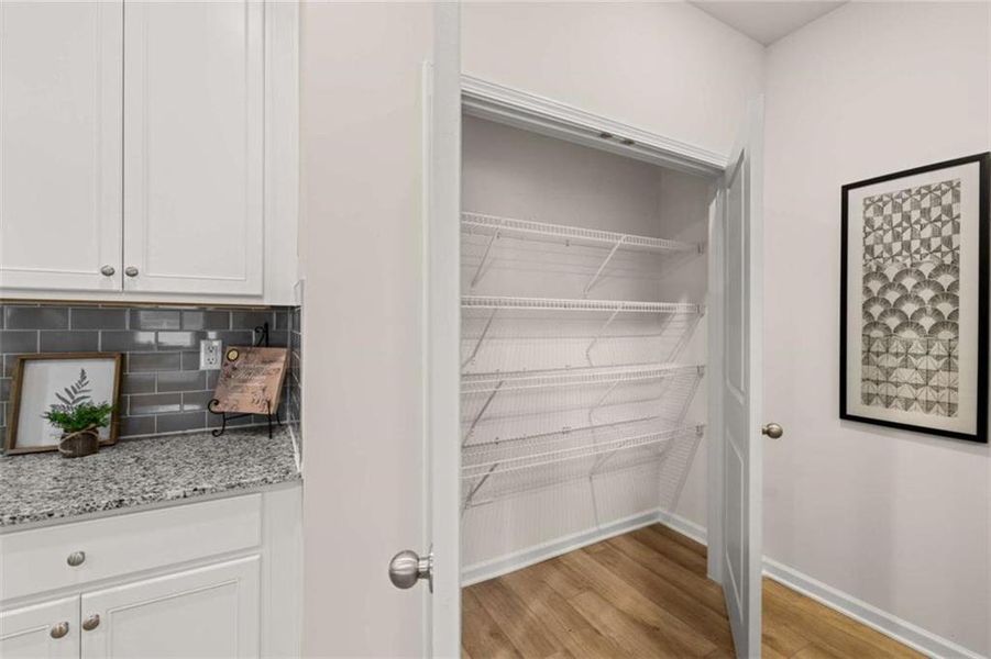 Furnished interior view inside a new home in Rivershire Place, Villa Rica (Image 40).