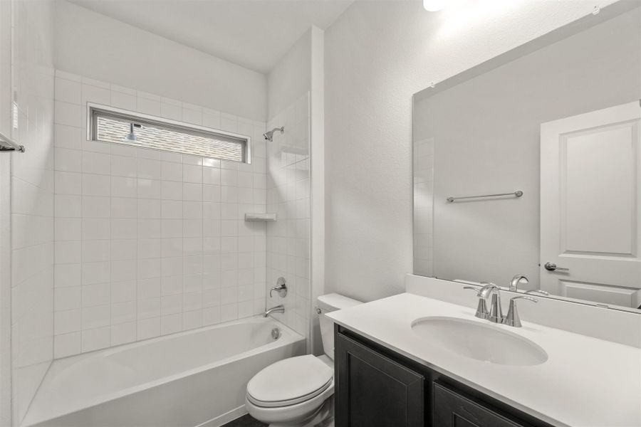 Furnished interior view inside a new home in The Reserve at Spiritas Ranch, Little Elm (Image 11).