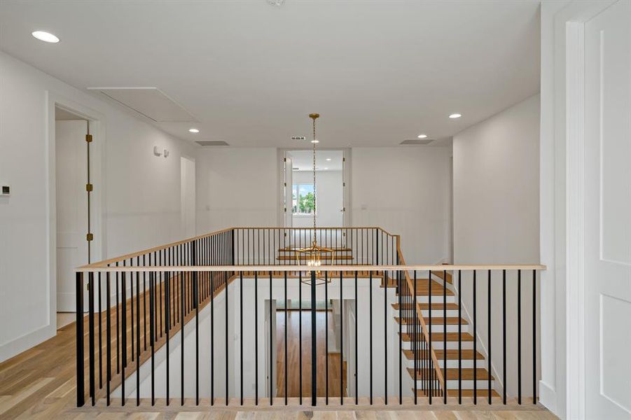 The second floor features a huge game room, an amazing storage closet, and three secondary bedrooms each with their own attached bathrooms.