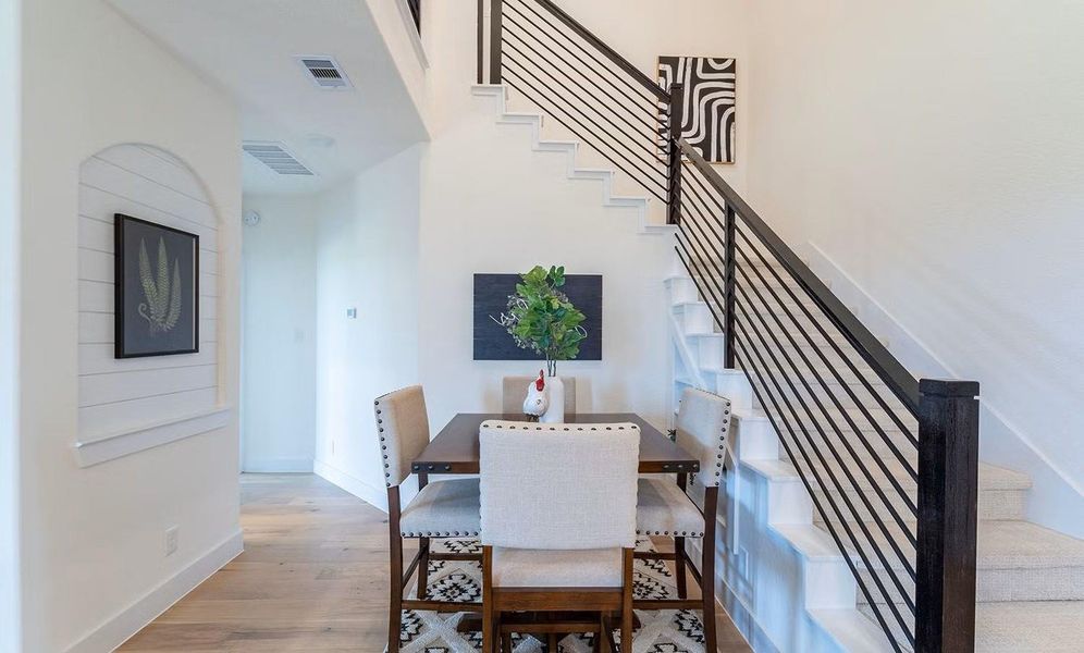 Cozy breakfast area positioned just off the kitchen, offering a casual dining space with an open view of the surrounding living areas, ideal for daily meals. **Photos are representative only and may vary as built.**