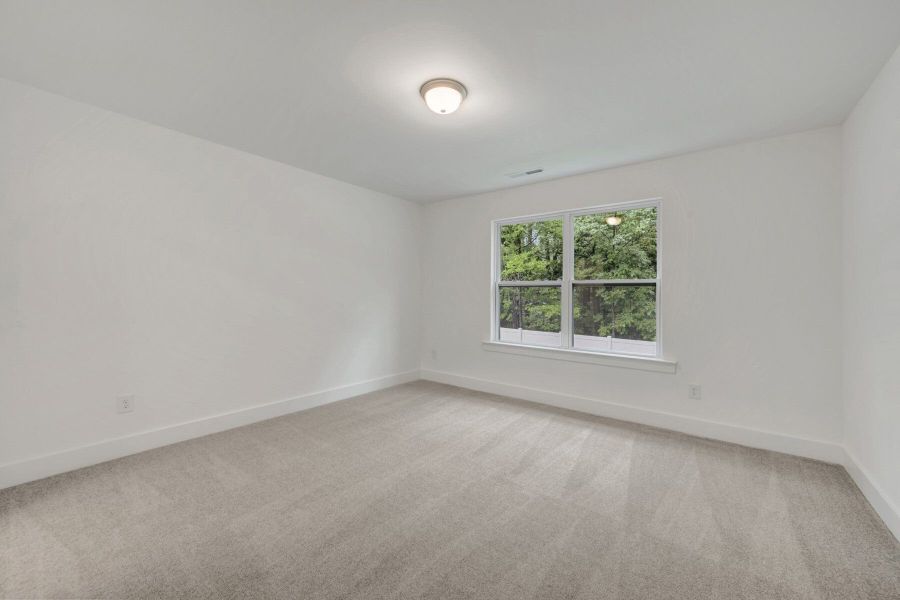 Spacious, unfurnished interior of a new home in Ashmore Townes, Garner (Image 19).