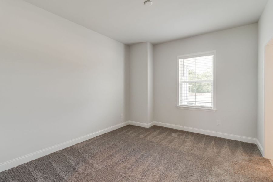 Spacious, unfurnished interior of a new home in Pecan Orchard, Elgin (Image 42).