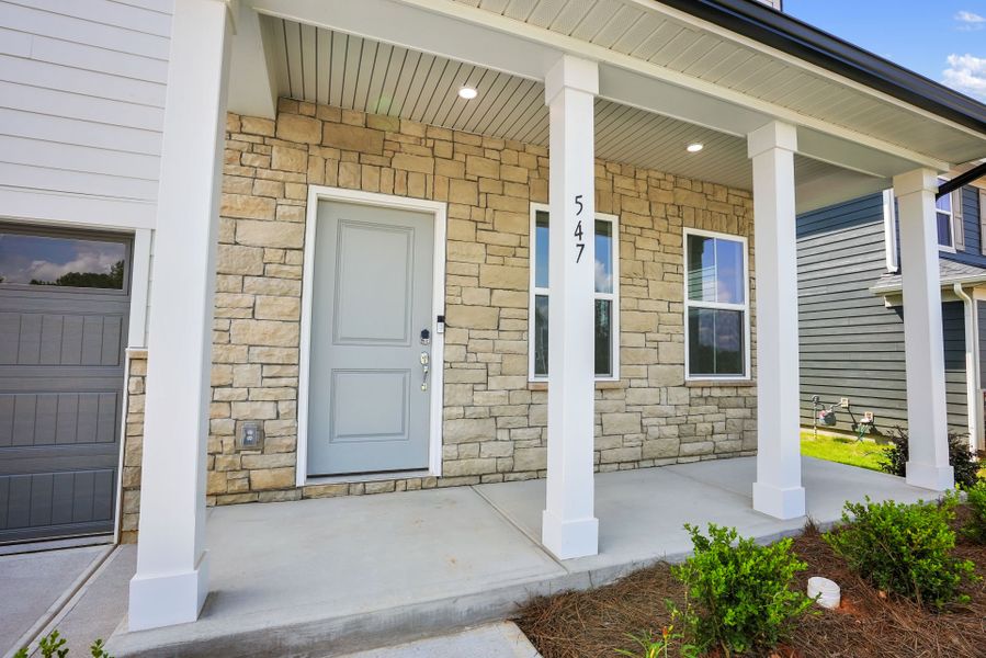 Exterior details and patio area of a home in Michaux Gardens, Belmont (Image 36).