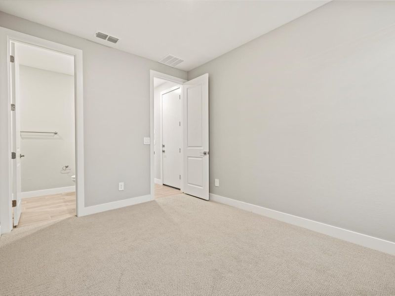 Spacious, unfurnished interior of a new home in Blossom Rock Reserve Series, Apache Junction (Image 13). Spacious, unfurnished interior of a new home in Blossom Rock Reserve Series, Apache Junction (Image 13).