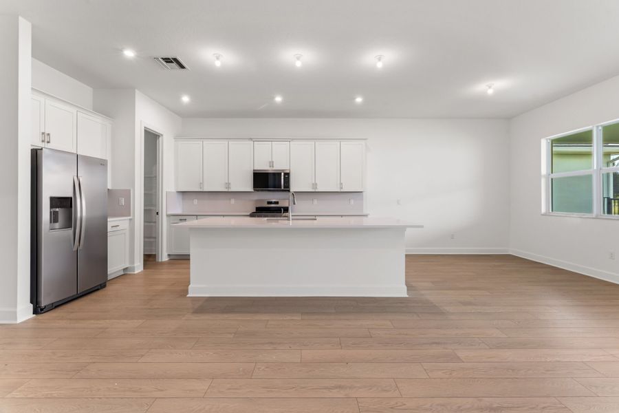 Furnished interior view inside a new home in Tradition, Port St. Lucie (Image 3).