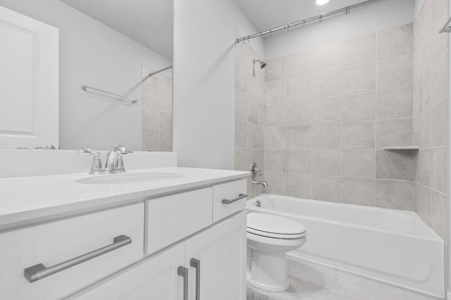 1 of 2 full bath on 2nd floor outside of the media room.