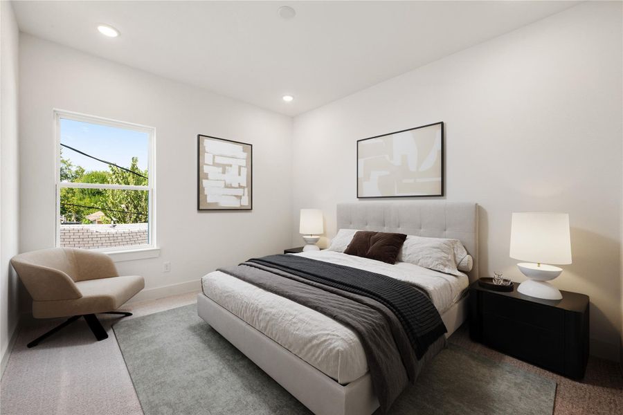 This secondary bedroom combines comfort and style, featuring plush carpeting, neutral paint, recessed lighting, a large window, and a spacious closet. *Virtually Staged