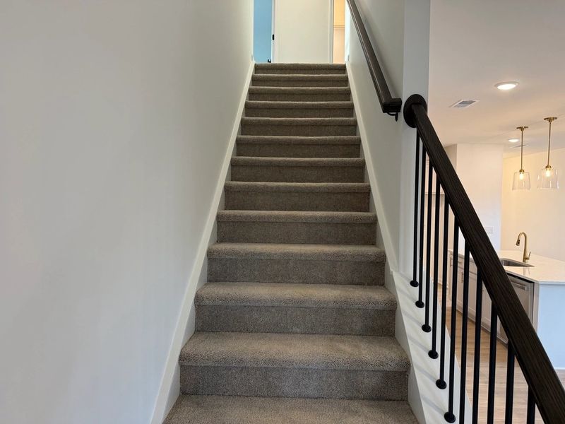 Staircase featuring the AW Collection® Serene - Clean lines and quiet tones lead the way. Staircase featuring the AW Collection® Serene - Clean lines and quiet tones lead the way.