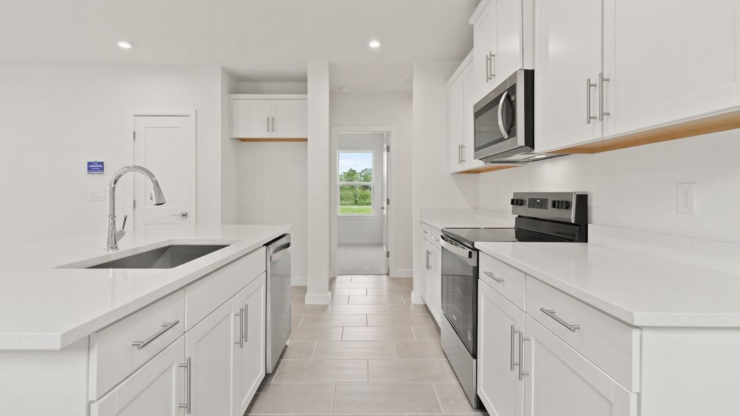 Representative furnished interior of a home built from the Flagler by DRB Homes in Grasslands West, Lakeland (Image 6).