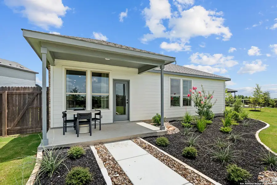 Front exterior of a new home in Dove Song, Marion, TX, highlighting curb appeal (Image 1).