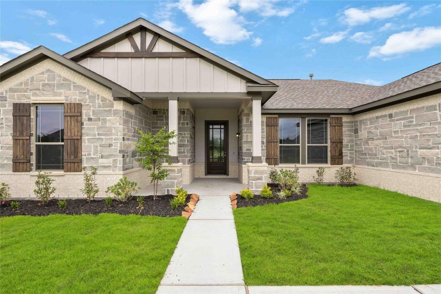 You and your guests will be greeted by a stunning front porch including a stained wood front door with modern glass paneling. You and your guests will be greeted by a stunning front porch including a stained wood front door with modern glass paneling.