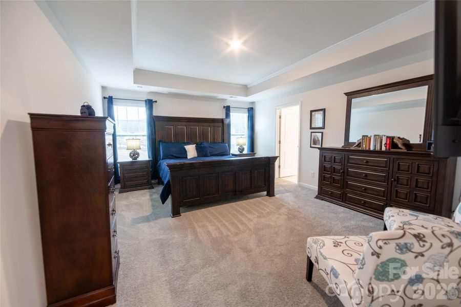 Luxurious primary suite on the second floor.