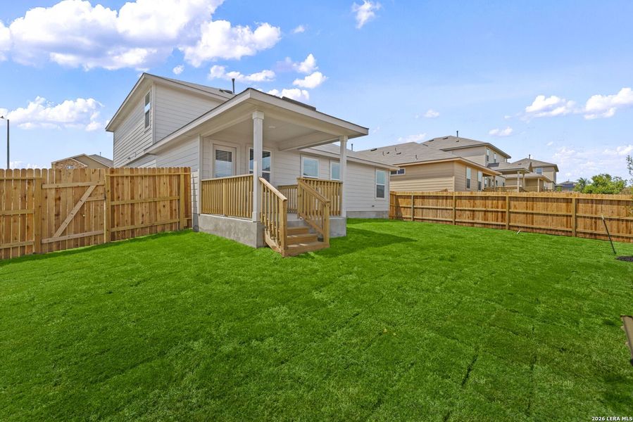 Exterior details and patio area of a home in Redbird Ranch, San Antonio (Image 3).