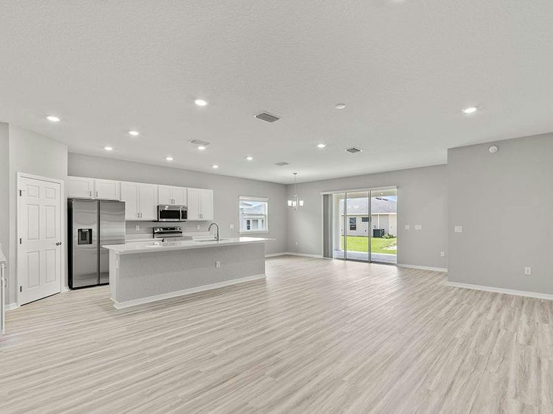 Enjoy a light-filled, open-concept living area - Aubrey II by Highland Homes Enjoy a light-filled, open-concept living area - Aubrey II by Highland Homes