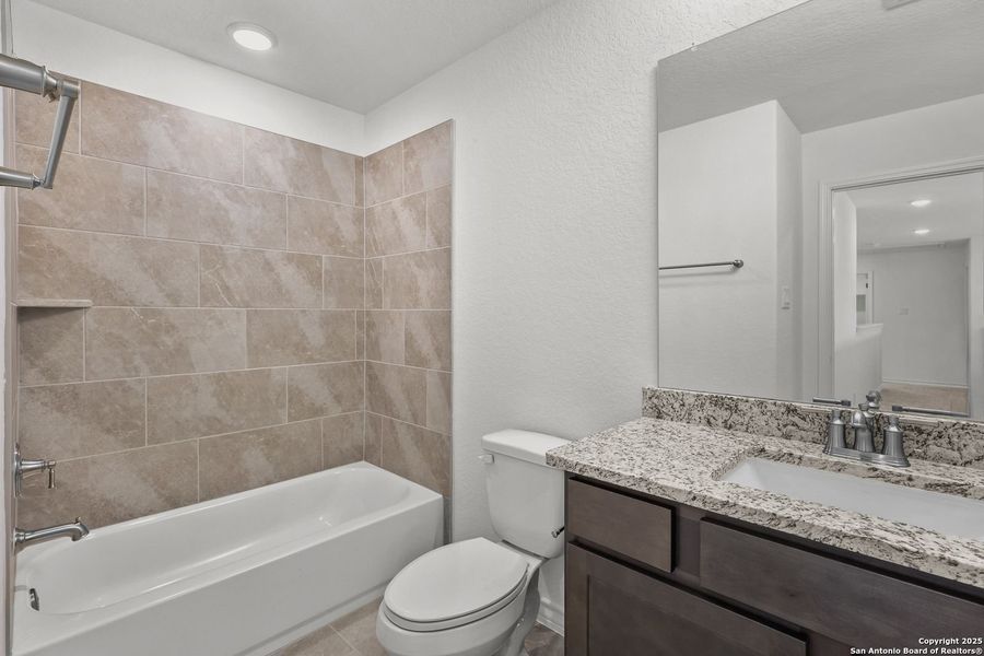 Furnished interior view inside a new home in Ladera, San Antonio (Image 40).