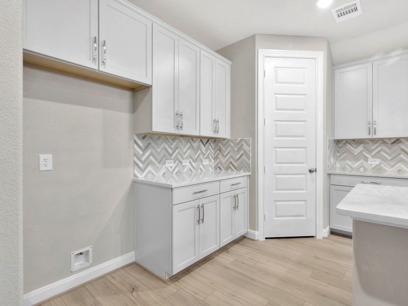 Furnished interior view inside a new home in Pine Lake Cove - Classic Series, Montgomery (Image 11).