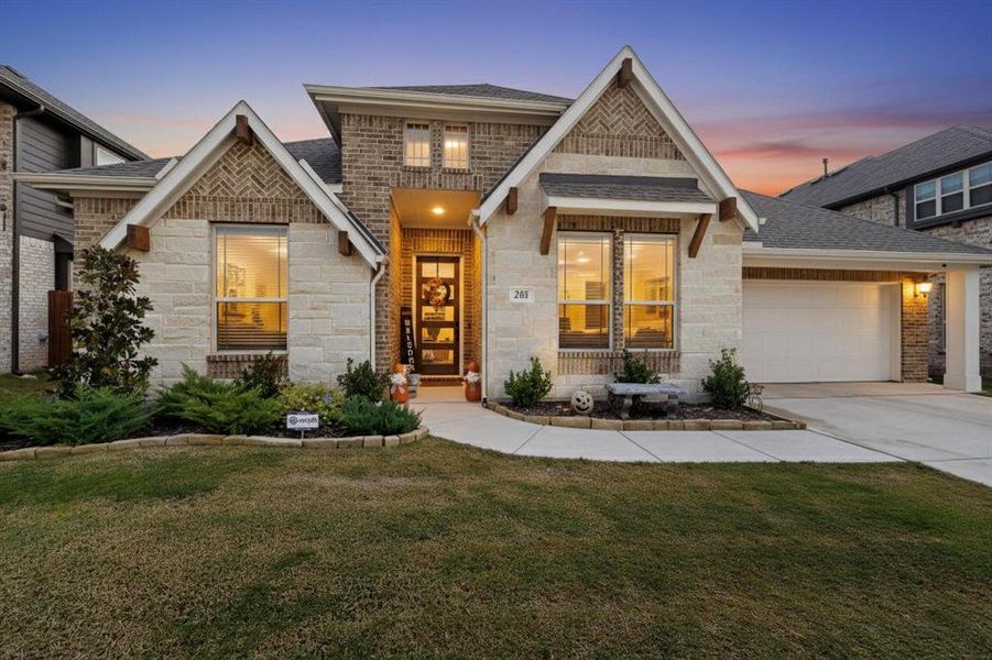 Front exterior of a new home in Clairmont Estates, Ponder, TX, highlighting curb appeal (Image 1).