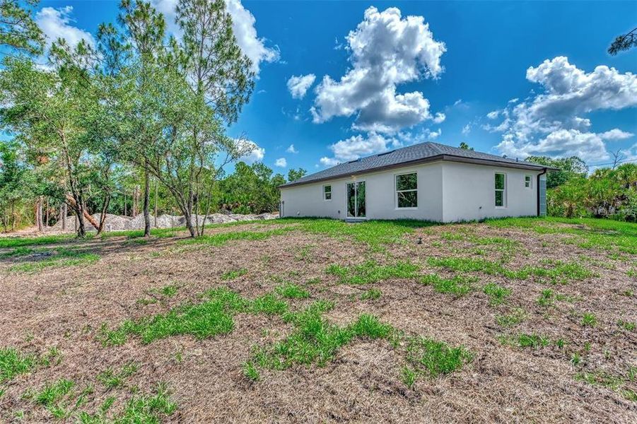 Exterior details and patio area of a home in , North Port (Image 17).