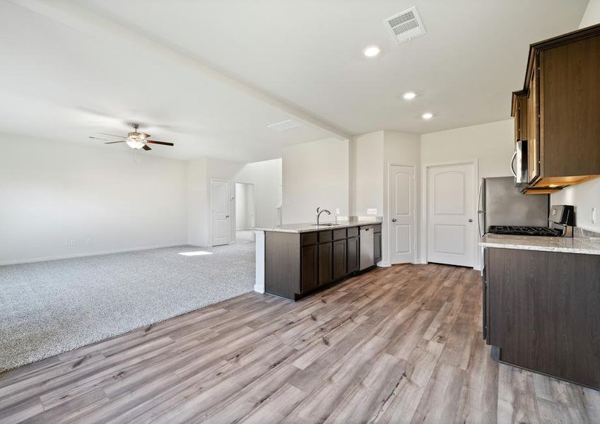 The kitchen of the Cypress sits right off the dining room and family room.