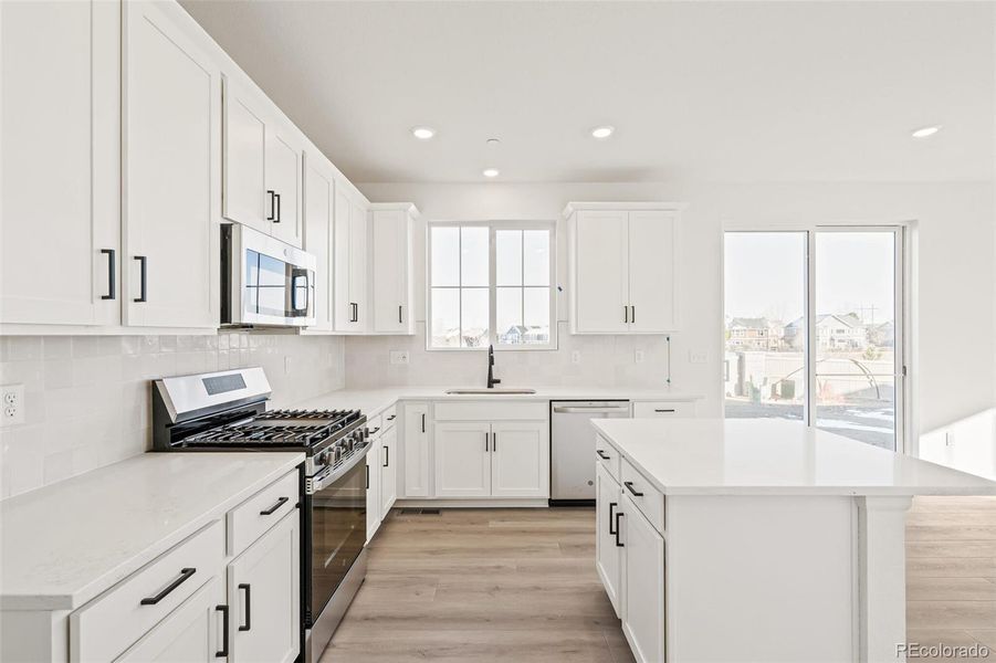 Furnished interior view inside a new home in The Nest Classic at Canyon Creek, Erie (Image 6).