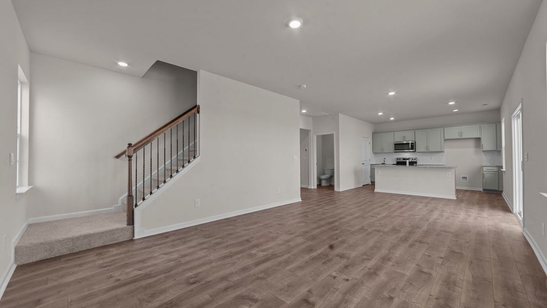 Representative unfurnished interior of a home built from the PENWELL by D.R. Horton in Ridgewood Farms, Winterville (Image 10). Representative unfurnished interior of a home built from the PENWELL by D.R. Horton in Ridgewood Farms, Winterville (Image 10).