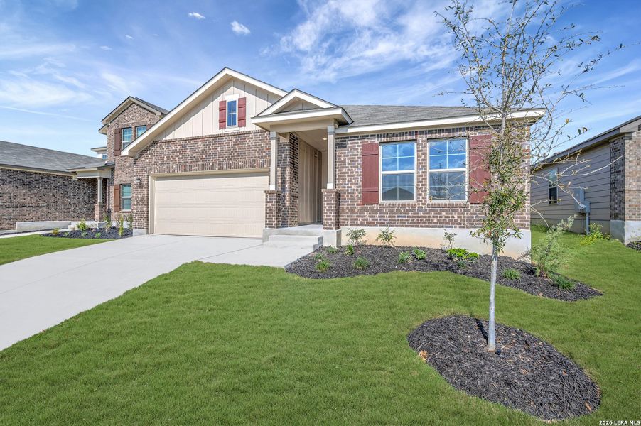 Front exterior of a new home in Paloma Park, Converse, TX, highlighting curb appeal (Image 26).