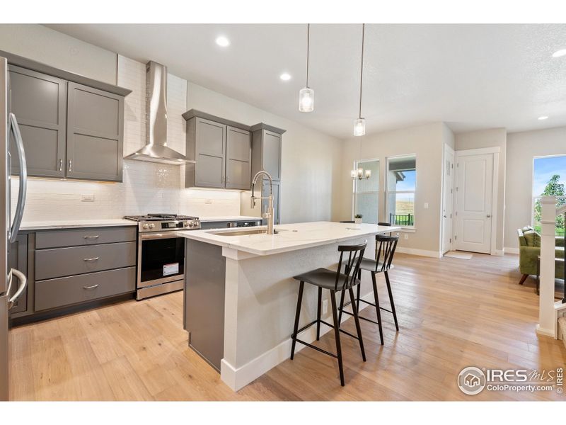 Gorgeous, timeless kitchen with plenty of storage! Photos of the actual home.