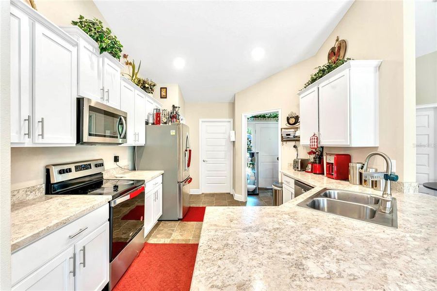 Furnished interior view inside a new home in Poinciana Enclave, Kissimmee (Image 4).