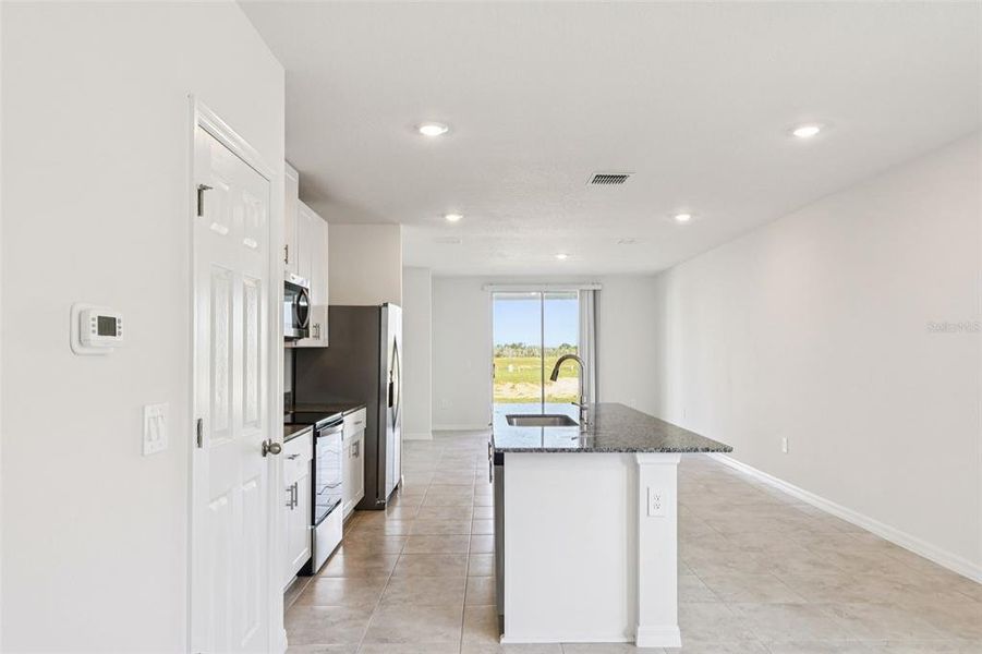 Furnished interior view inside a new home in , Lake Alfred (Image 8).