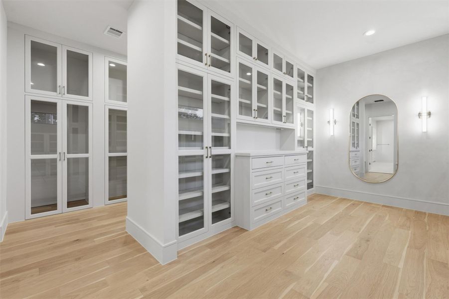 Large primary his and hers closet