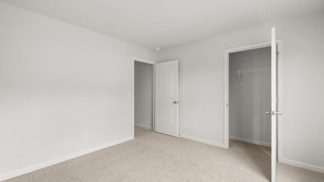 Spacious, unfurnished interior of a new home in Northwoods at Mirror Lake, Villa Rica (Image 34).